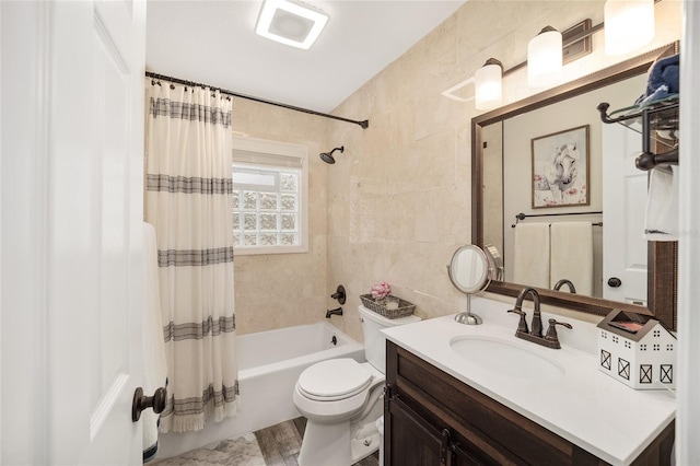 full bathroom featuring shower / bathtub combination with curtain, toilet, vanity, tile walls, and hardwood / wood-style flooring