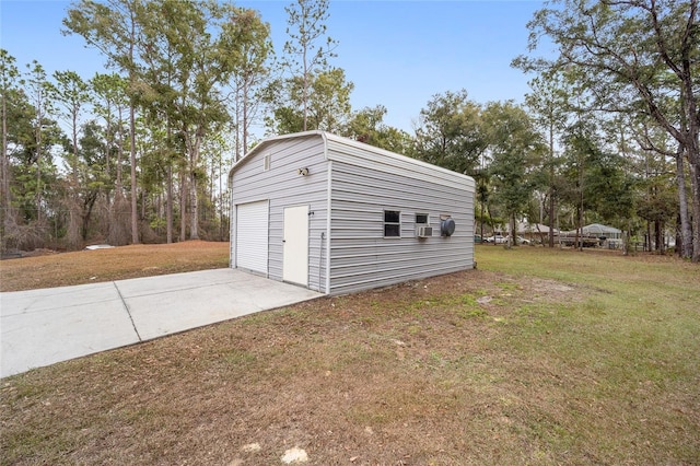 garage with a lawn