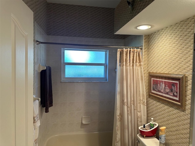 bathroom with shower / tub combo