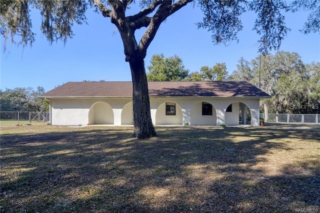 exterior space featuring a front lawn