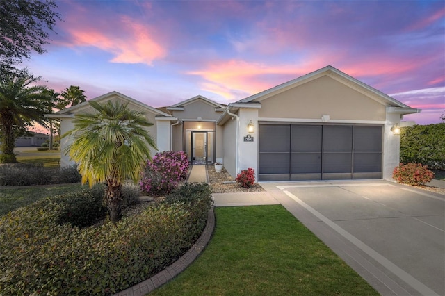 ranch-style home with a garage