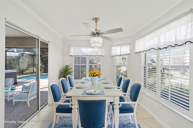 sunroom featuring ceiling fan