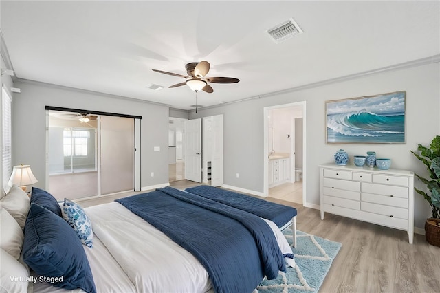 bedroom with ceiling fan, ensuite bath, crown molding, and light hardwood / wood-style floors