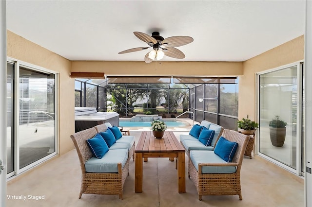 sunroom / solarium with ceiling fan