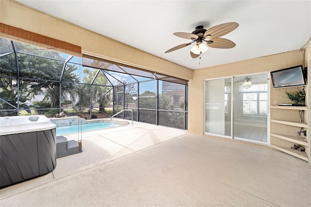 view of swimming pool with ceiling fan