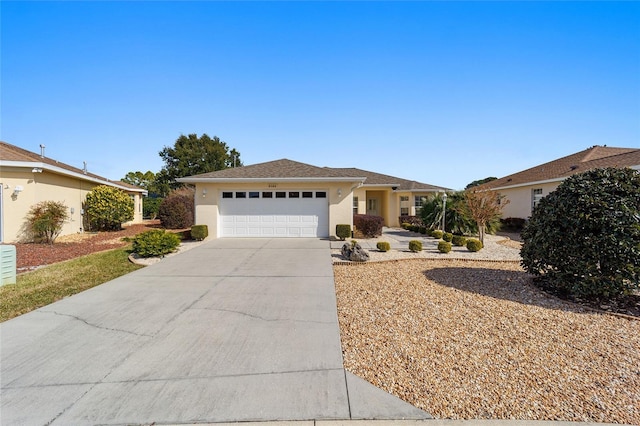 single story home with a garage