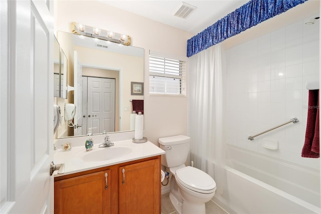 full bathroom featuring vanity, shower / bath combo, and toilet