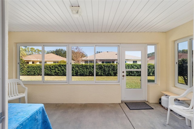 sunroom featuring plenty of natural light