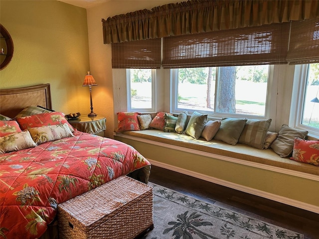 bedroom featuring hardwood / wood-style flooring