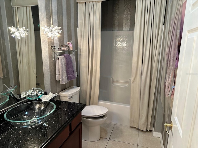 full bathroom with tile patterned floors, vanity, toilet, and shower / tub combo with curtain