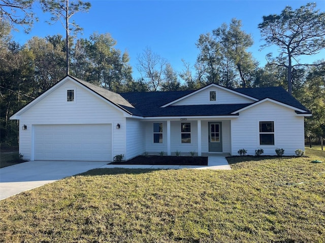 single story home featuring a porch, a garage, and a front lawn