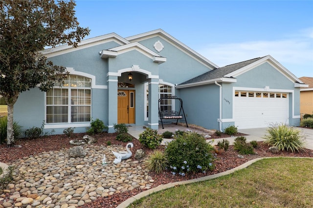 view of front of property with a garage