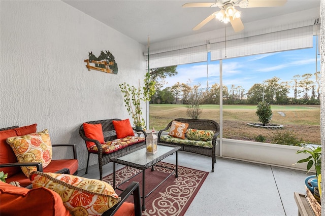 sunroom with ceiling fan