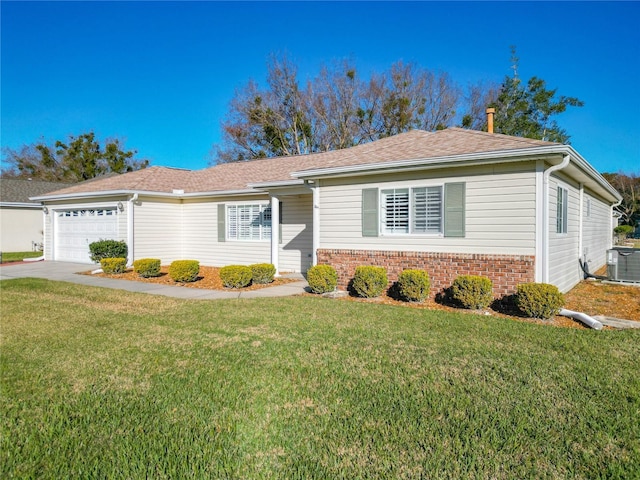 ranch-style home featuring central AC unit, a garage, and a front yard