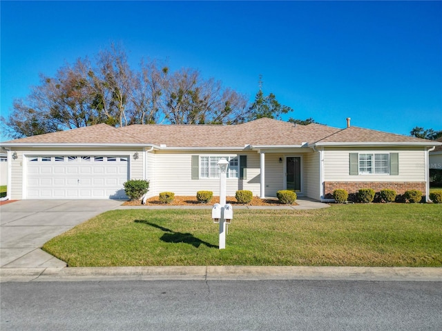 ranch-style home featuring a garage and a front yard