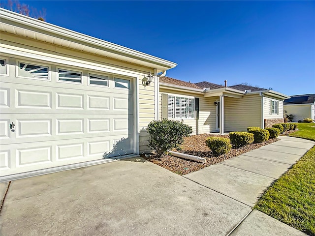 single story home featuring a garage