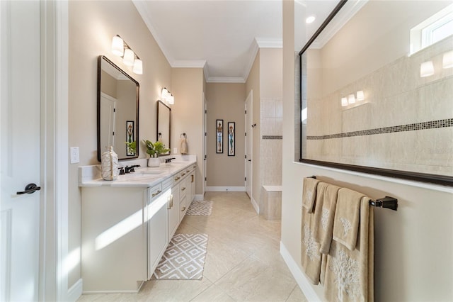 bathroom with tile patterned floors, vanity, tiled shower, and crown molding