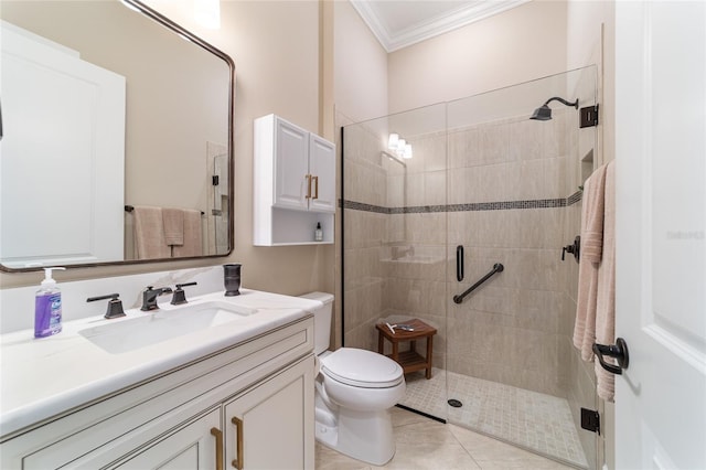 bathroom with vanity, crown molding, tile patterned flooring, toilet, and walk in shower