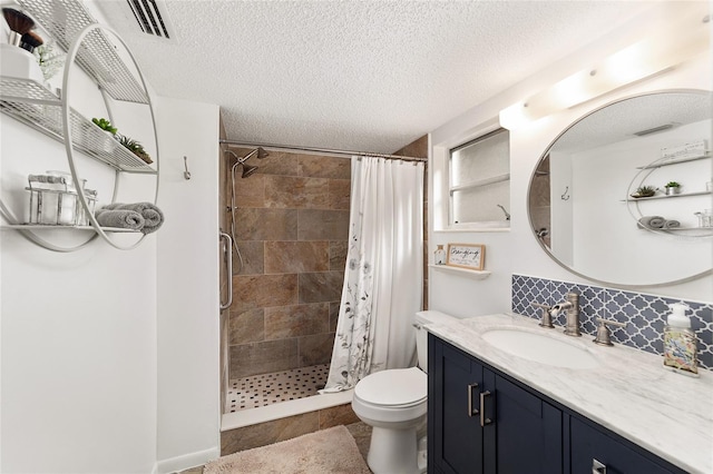 bathroom with vanity, toilet, a textured ceiling, walk in shower, and tasteful backsplash