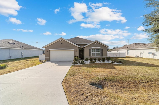 single story home with a front yard and a garage