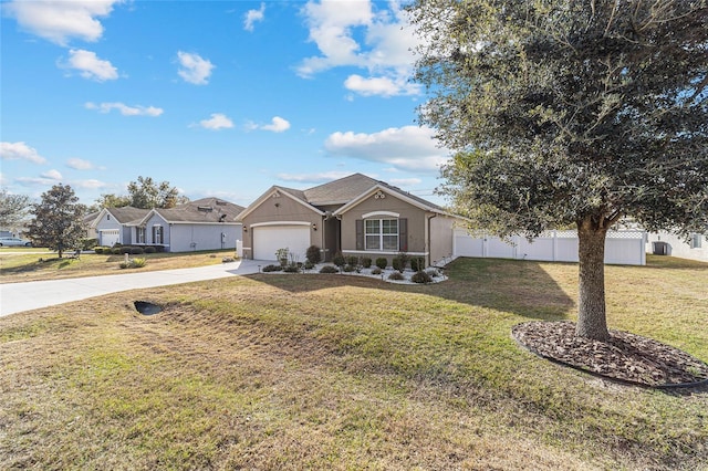 ranch-style home with a garage and a front yard