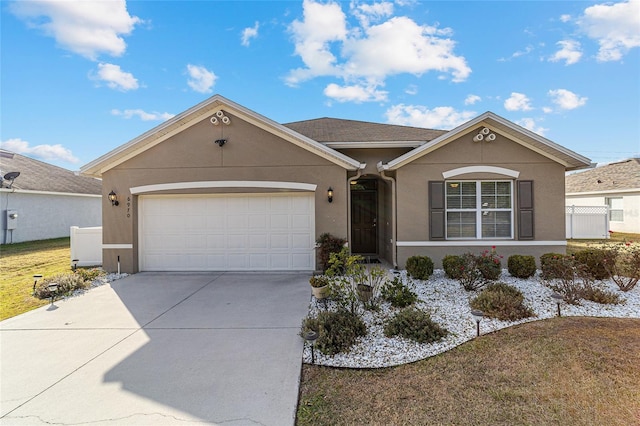 ranch-style home featuring a garage