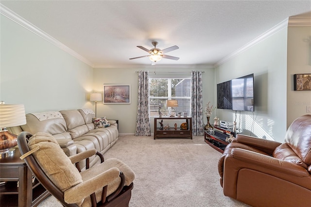 carpeted living room with crown molding and ceiling fan