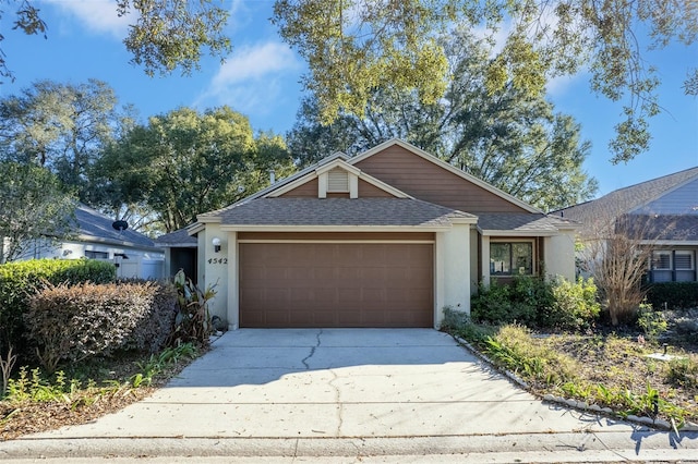 ranch-style home with a garage