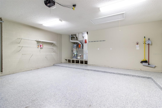 garage with heating unit, a garage door opener, and water heater