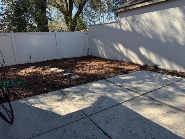 view of patio with fence