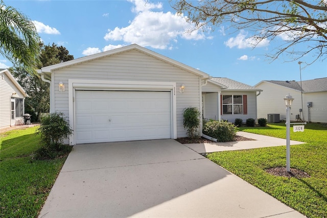 ranch-style home with central AC and a front lawn