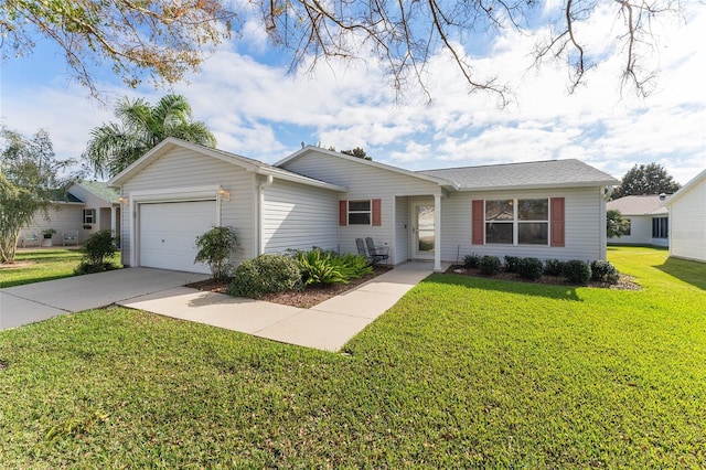 single story home featuring a garage and a front lawn