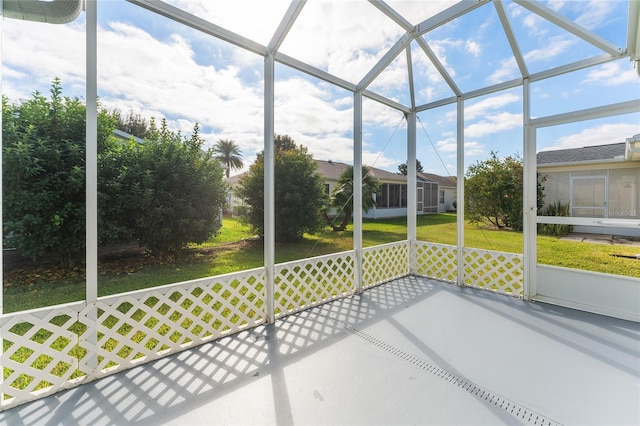 unfurnished sunroom with plenty of natural light