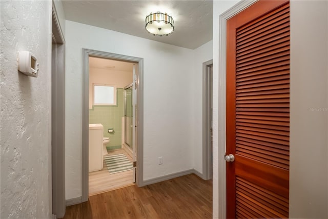 hall featuring light hardwood / wood-style flooring