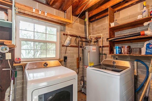 laundry area featuring independent washer and dryer and gas water heater