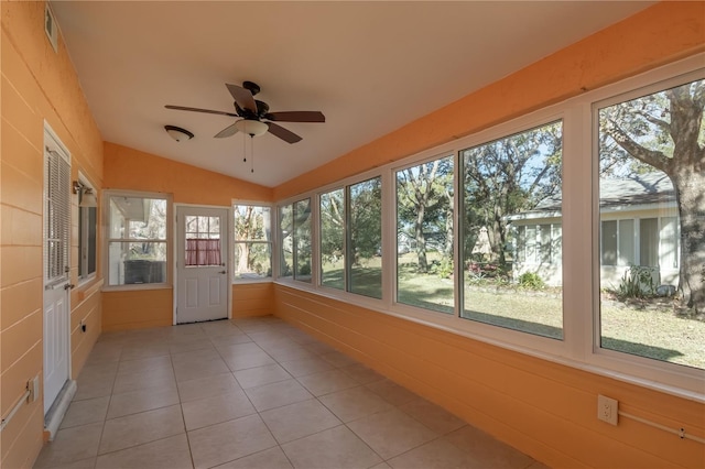 unfurnished sunroom featuring ceiling fan and lofted ceiling