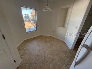 view of unfurnished dining area