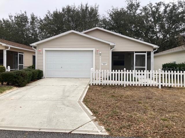 single story home with a garage