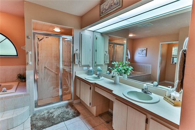 bathroom with vanity, tile patterned flooring, and separate shower and tub