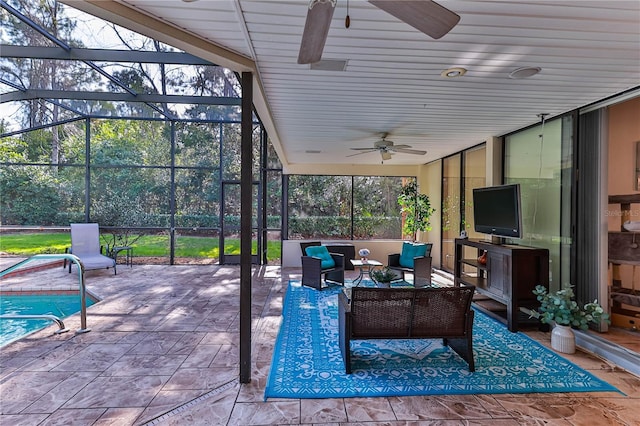 view of patio with ceiling fan, a lanai, and an outdoor hangout area