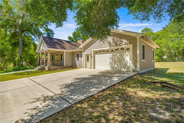 single story home featuring a front lawn, a porch, and a garage