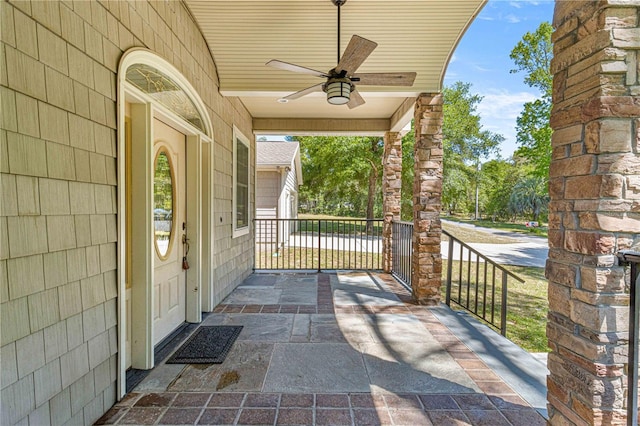 view of patio with a porch and ceiling fan