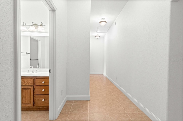 bathroom featuring tile patterned floors and vanity