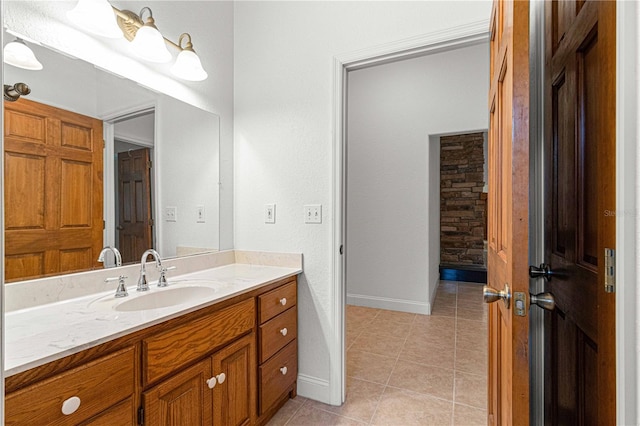 bathroom featuring tile patterned floors and vanity