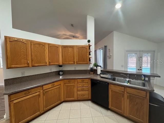 kitchen featuring vaulted ceiling, dishwasher, sink, kitchen peninsula, and light tile patterned flooring