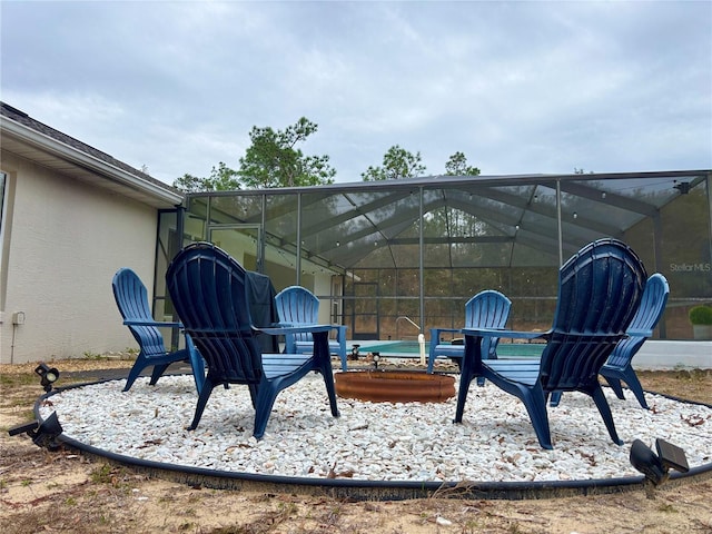 view of patio with a lanai