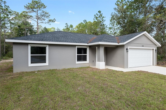 single story home featuring a front lawn and a garage