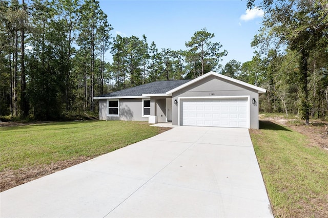 single story home with a front yard and a garage