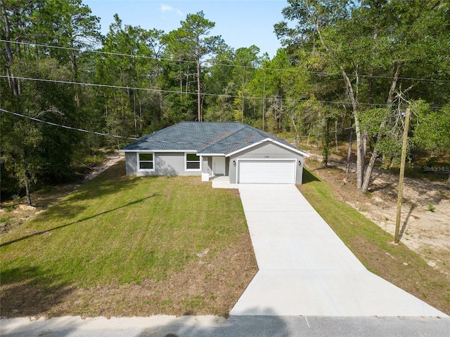 view of front facade featuring a garage and a front lawn