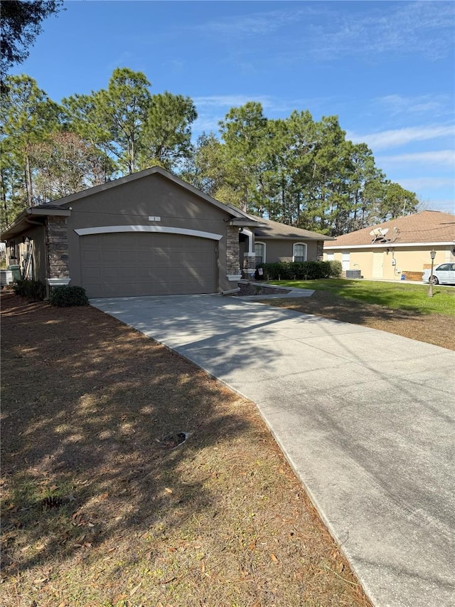 single story home featuring a garage